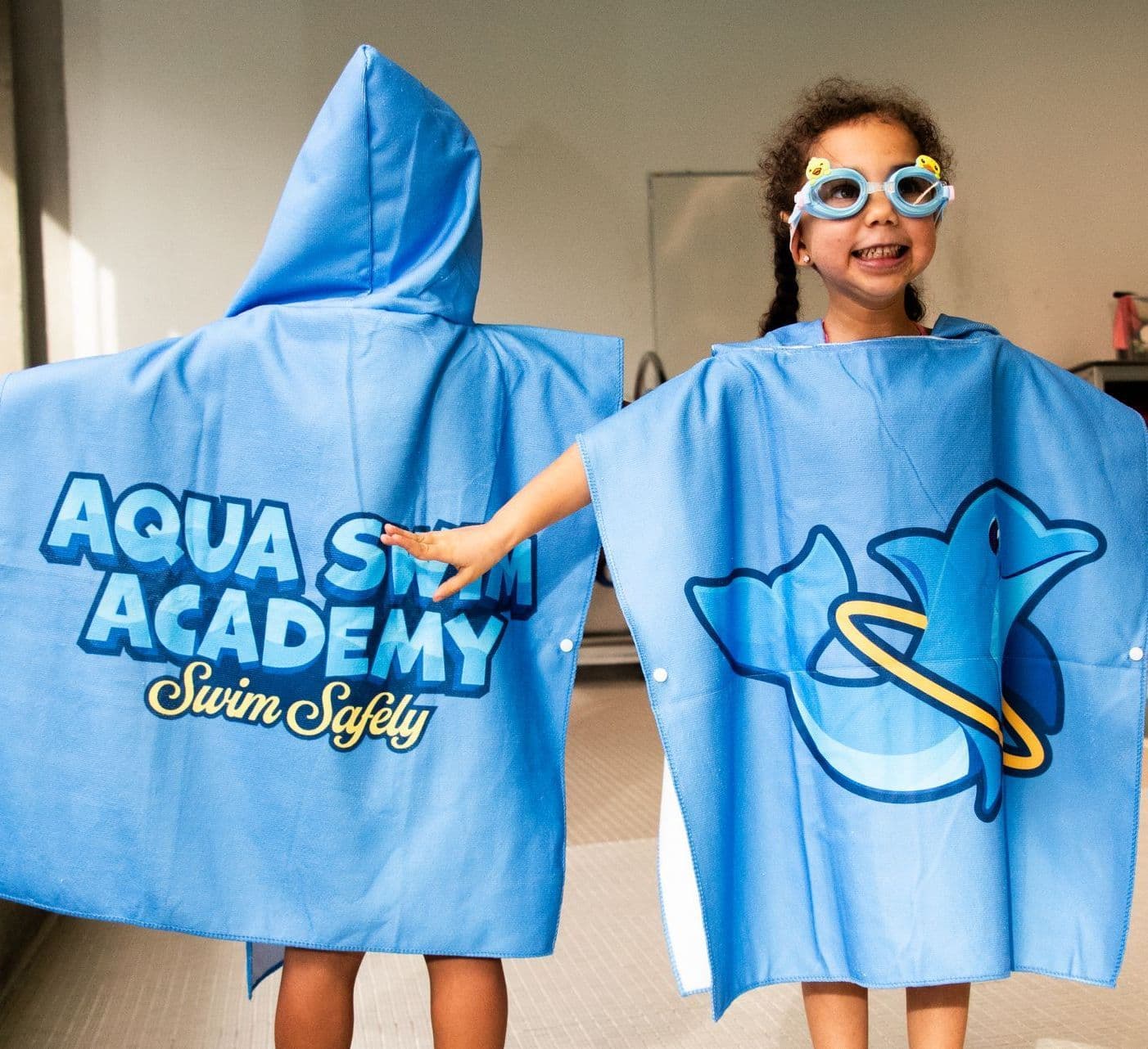 Aqua Swim Academy coach with a young class